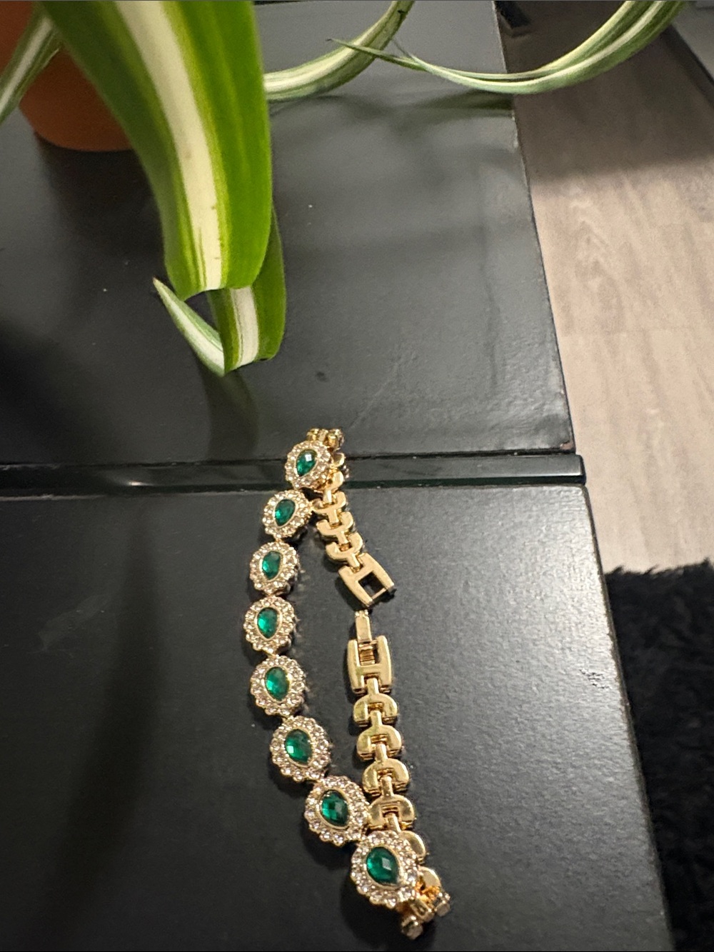 Gold Bracelet with Emerald Green Stones